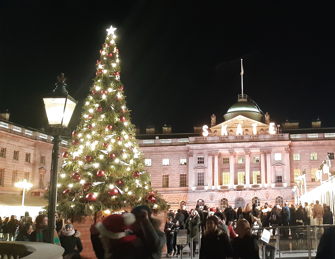 Skating area decorated with Christmas tree and lights